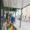 Bicycle rack Arc, multi-coloured in cycle roof SHARP, Plaza Nyköping